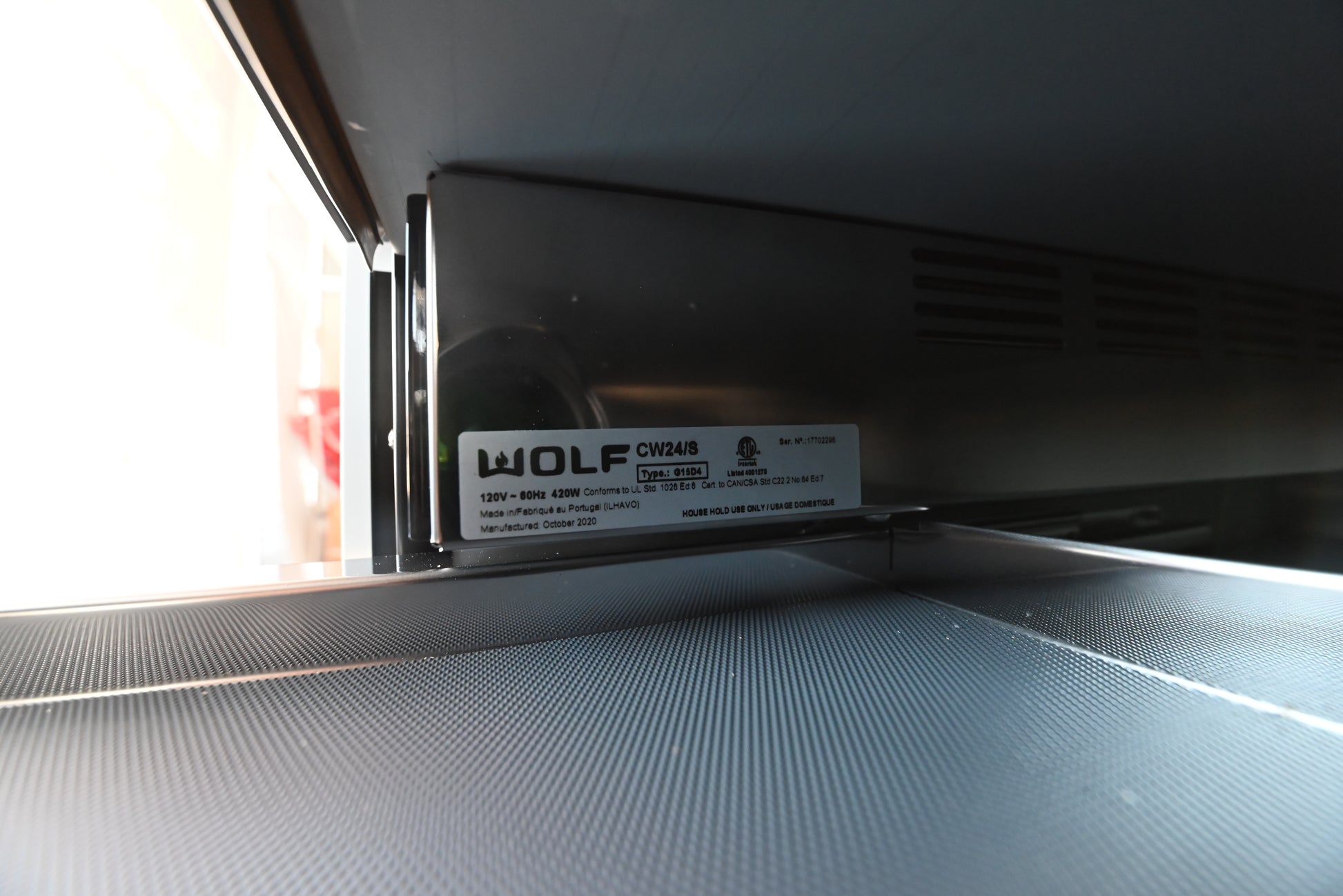 Wolf cup warming drawer open showing anti slip liner holding espresso mugs