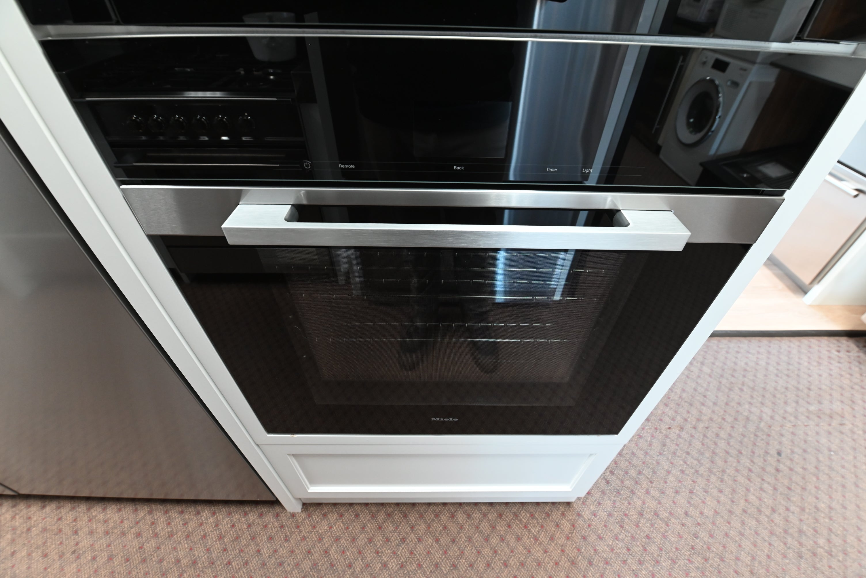 Miele H 7680 BP 30 inch built in convection wall oven front view in clean touch steel
