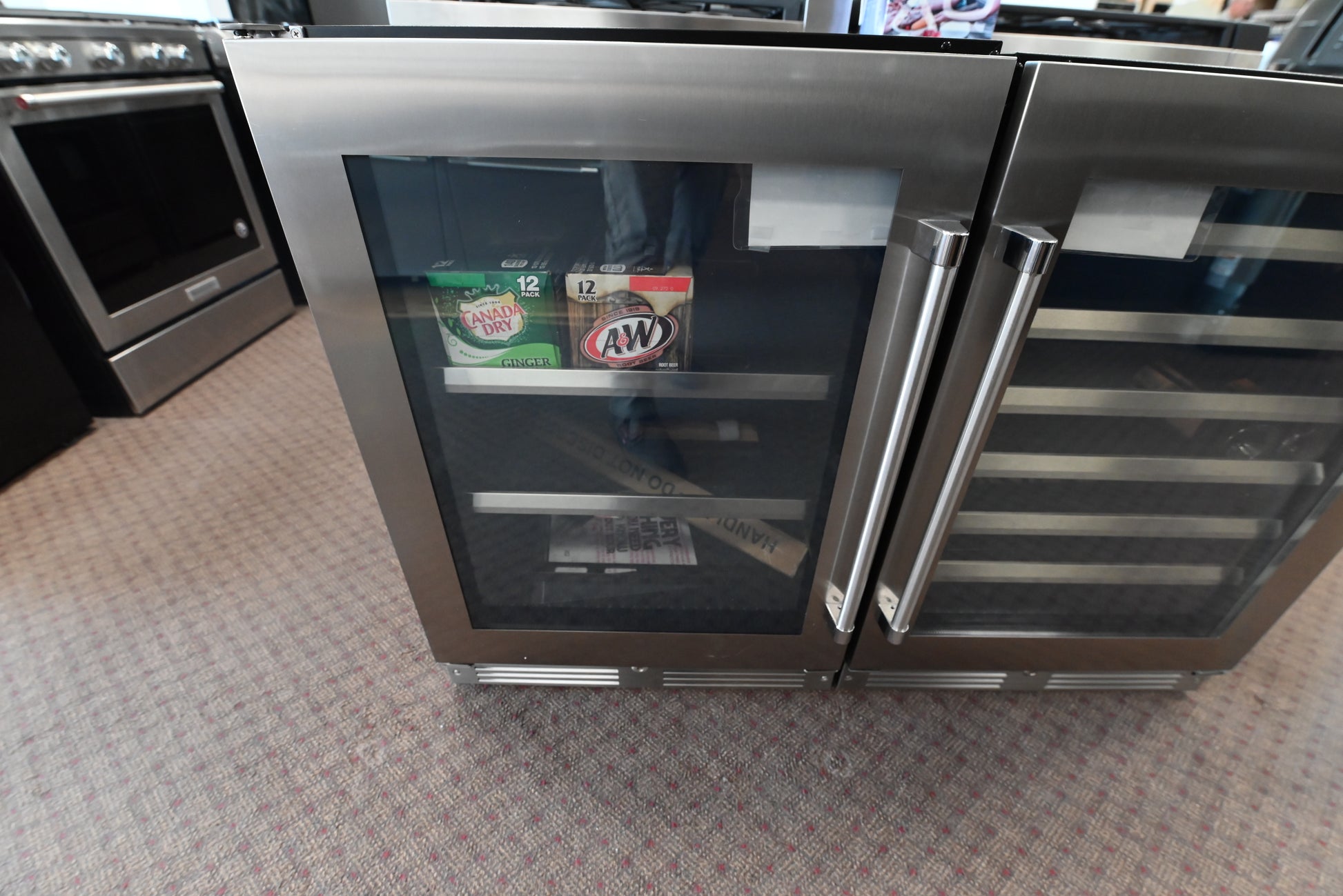 XO 24 inch built in beverage center XOU24BCGSL with glass door and stainless steel frame