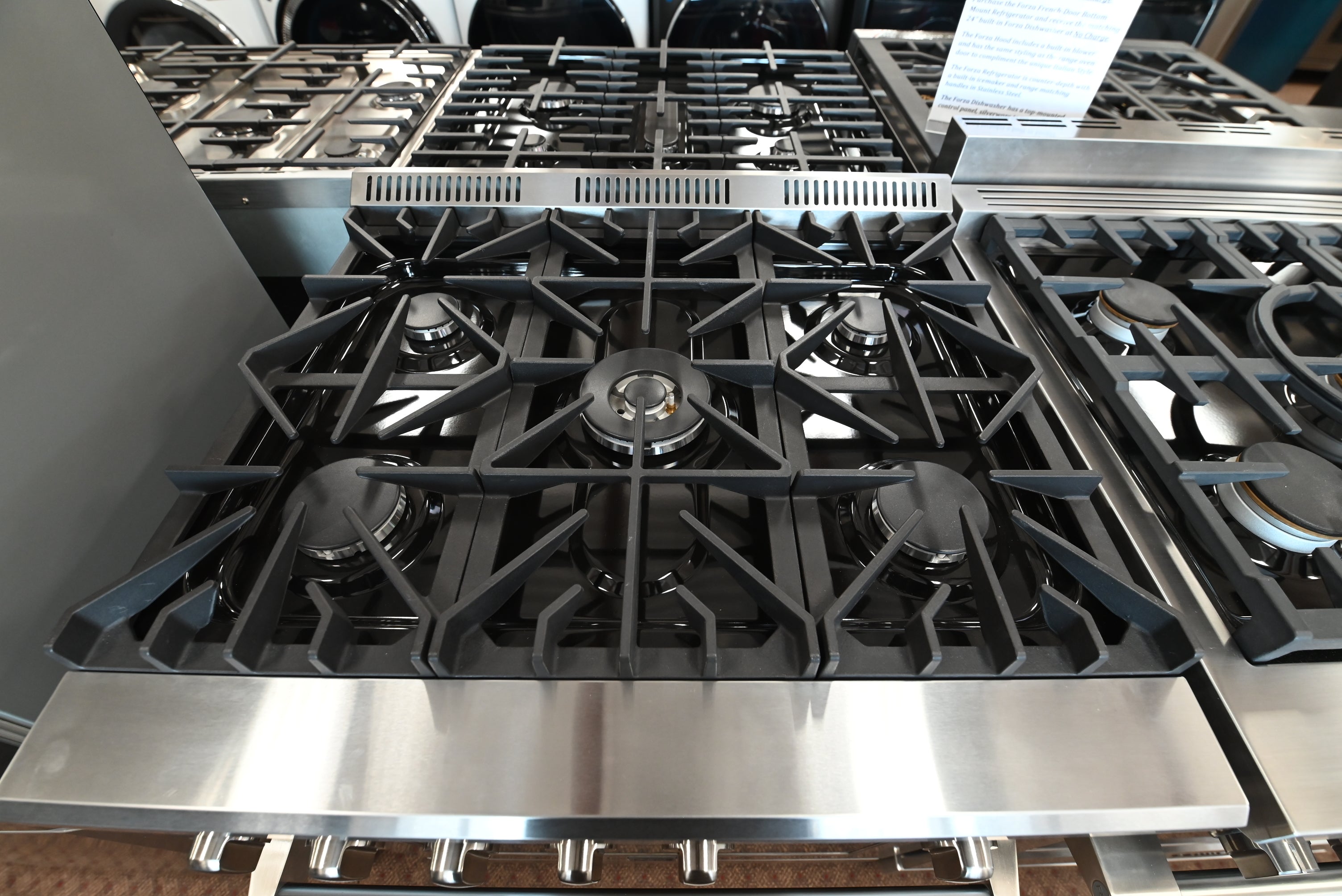 Close up of Forno gas range control panel and professional oven handle