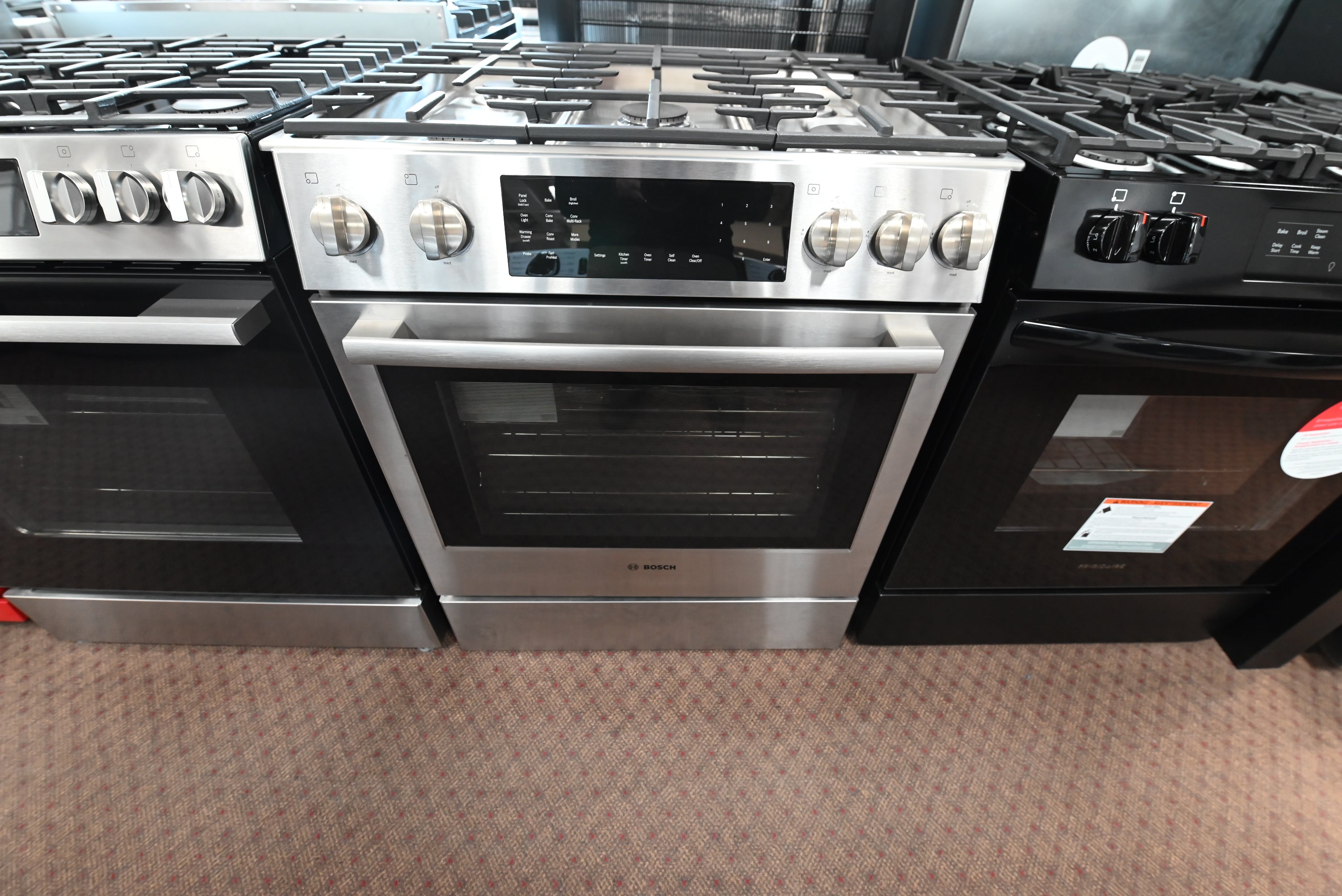 Bosch HDI8056U 800 Series 30 inch slide in dual fuel range front view stainless steel