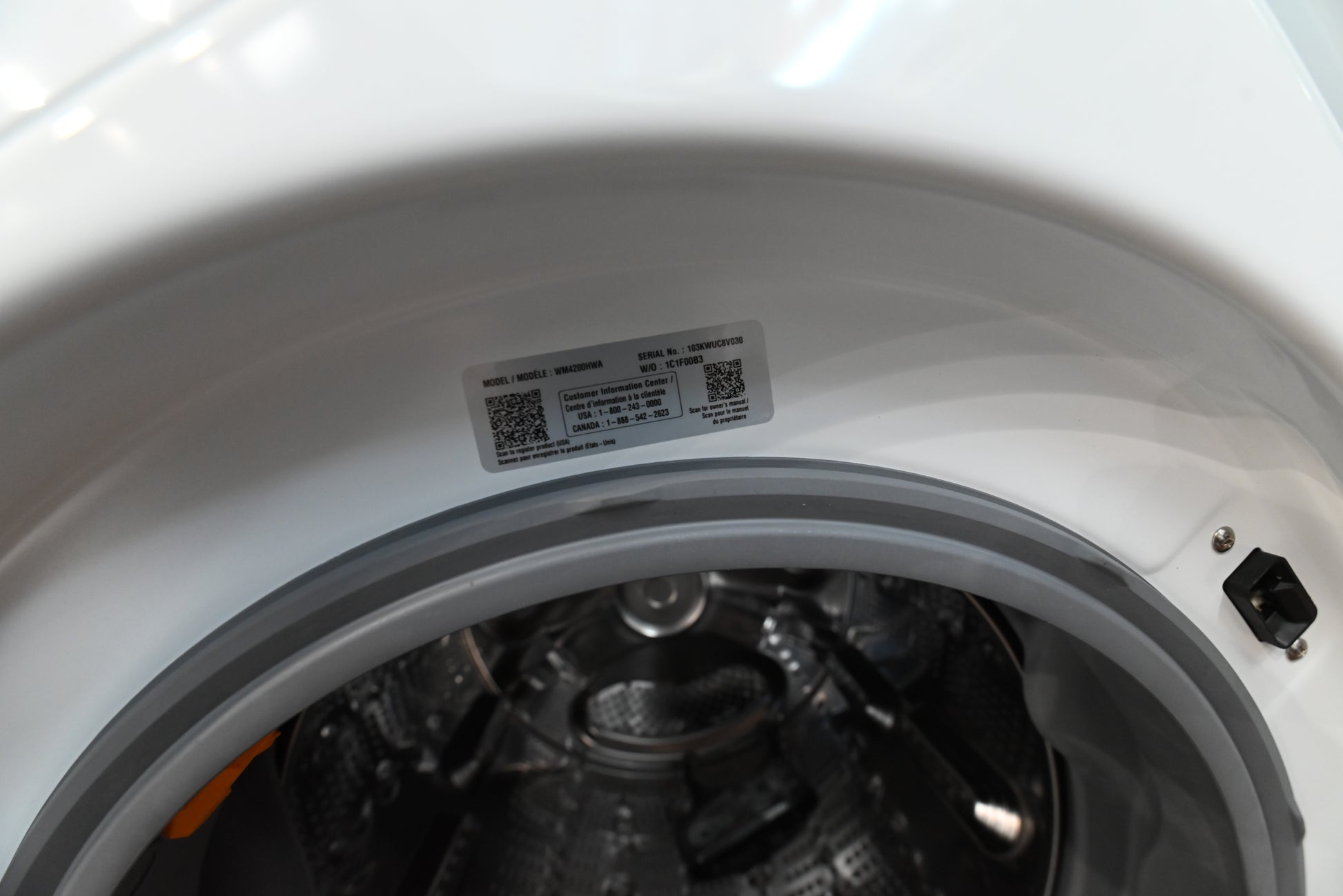 LG 24 smart washer looking at front centered Dial-A-Cycle knob and digital LED touch control strip
