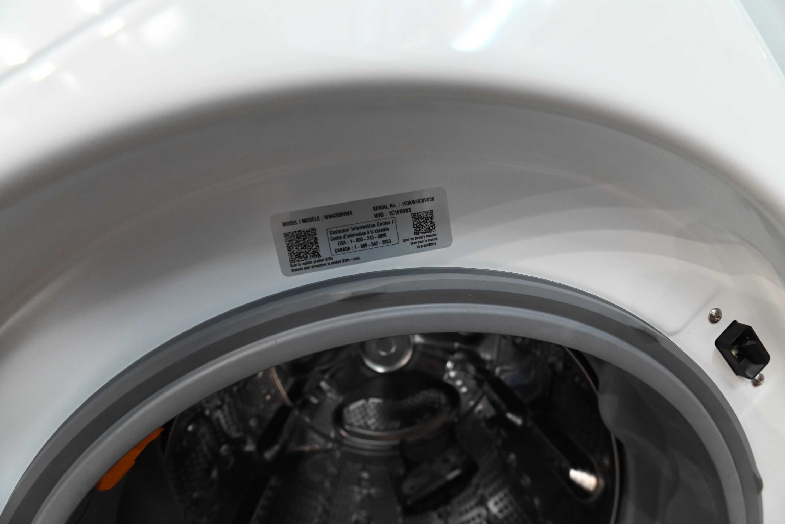 LG 24 smart washer looking at front centered Dial-A-Cycle knob and digital LED touch control strip