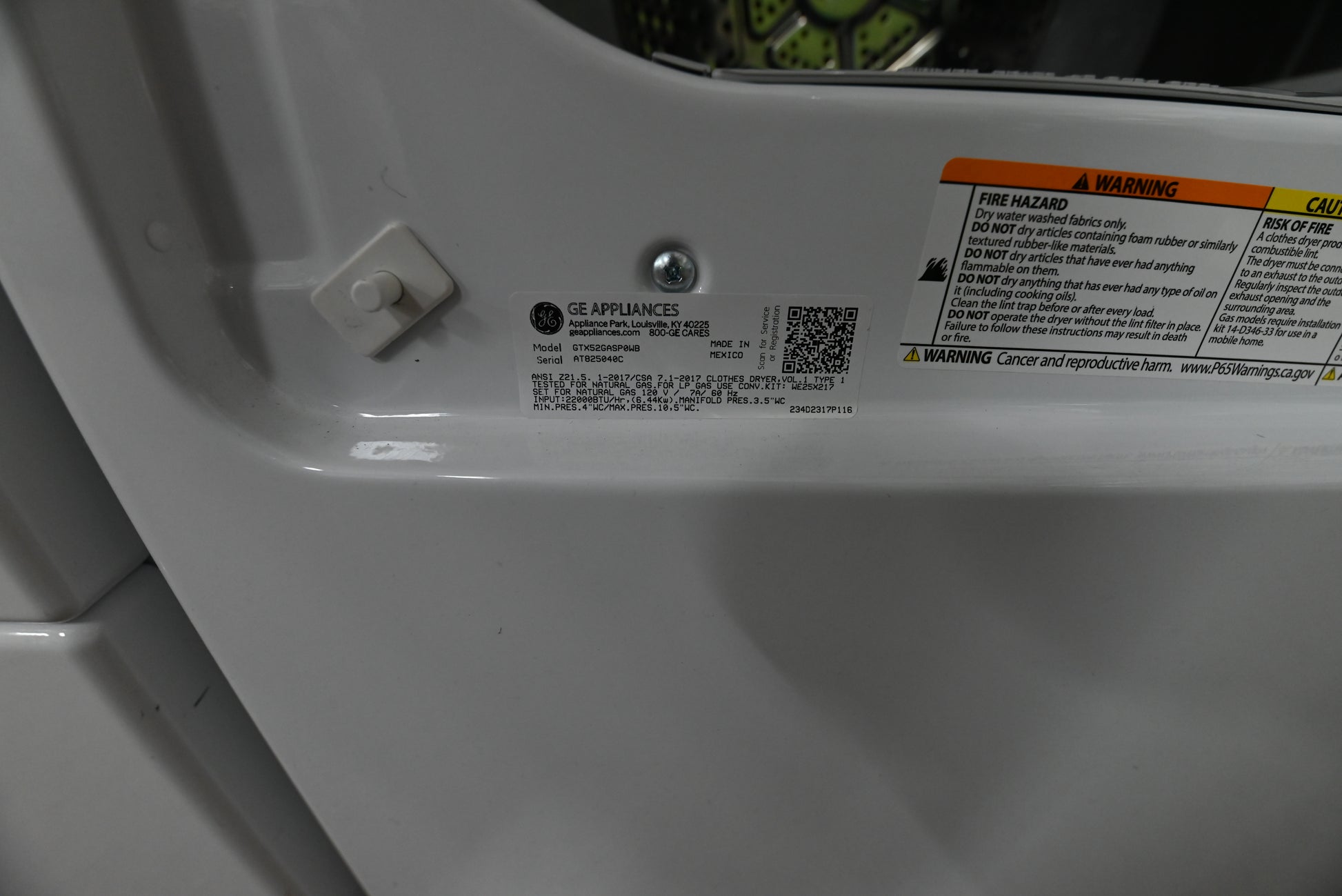 Interior view of the aluminized alloy drum and lint filter in the GE 6.2 cu ft gas dryer