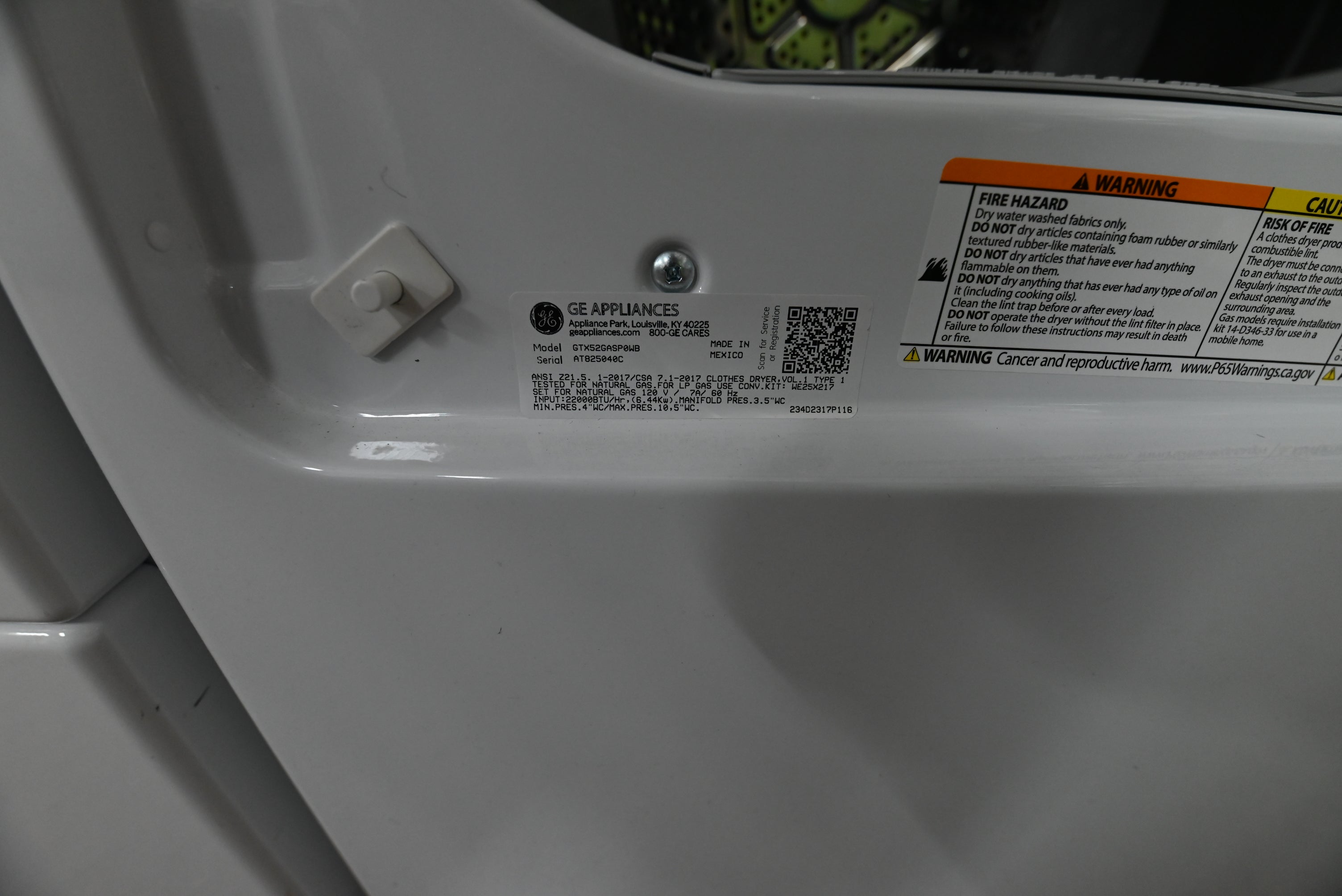 Interior view of the aluminized alloy drum and lint filter in the GE 6.2 cu ft gas dryer