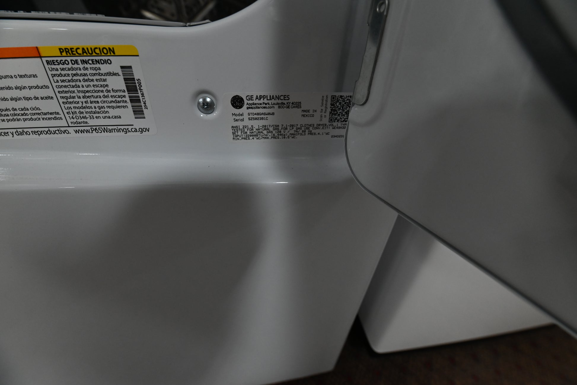 Interior view of the large 7.2 cu ft aluminized alloy drum in the GE white gas dryer