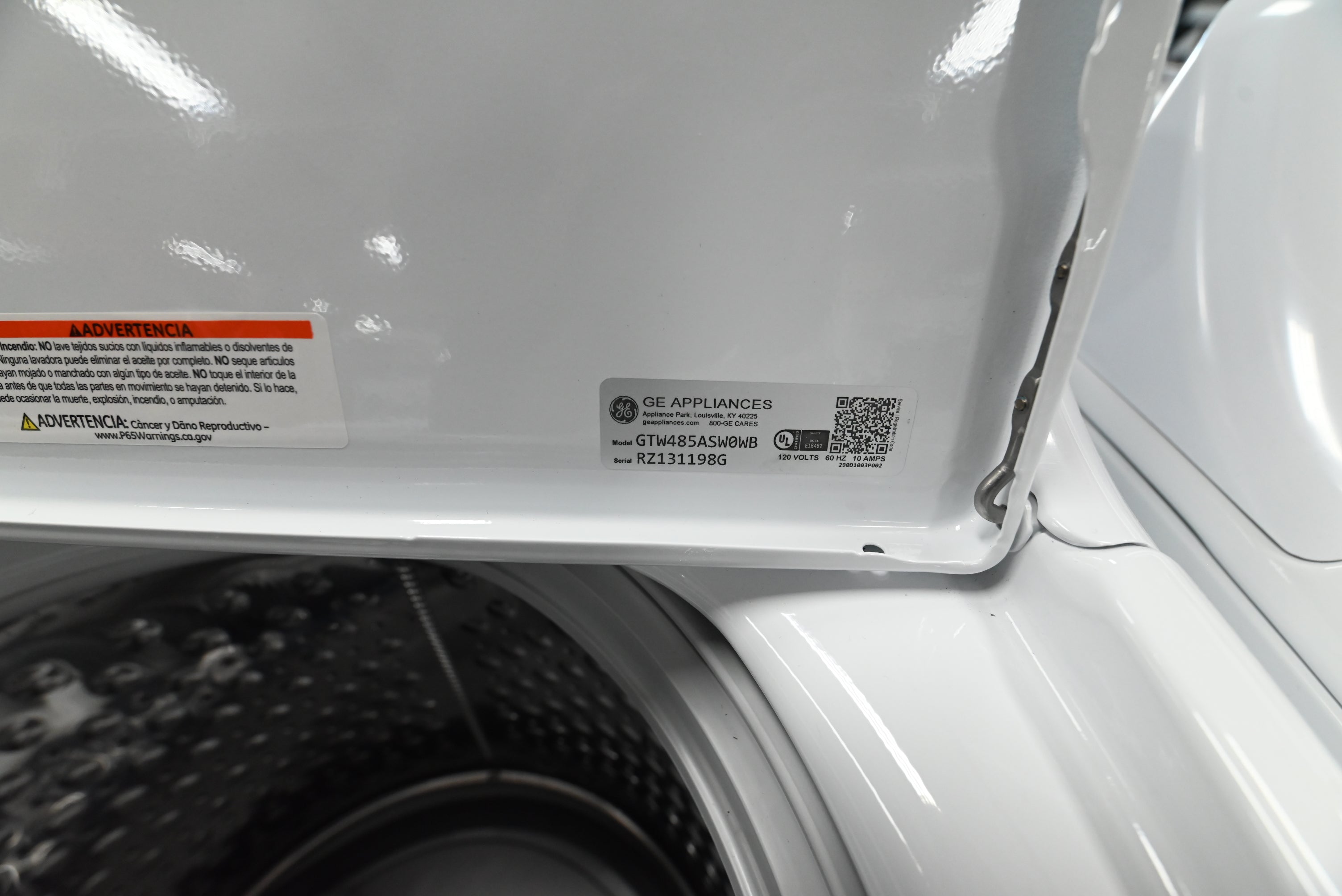 Detail view of the Wash Boost Cold Plus and Deep Fill control dials on the GE white washer