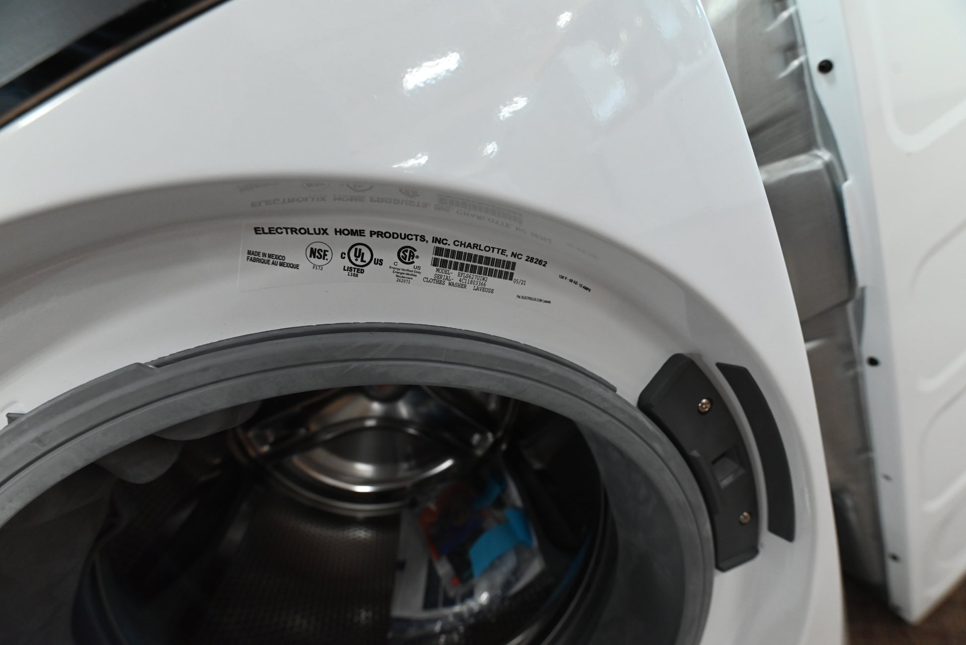 Electrolux 4.4 cu ft stainless steel washer drum open showing spacious capacity