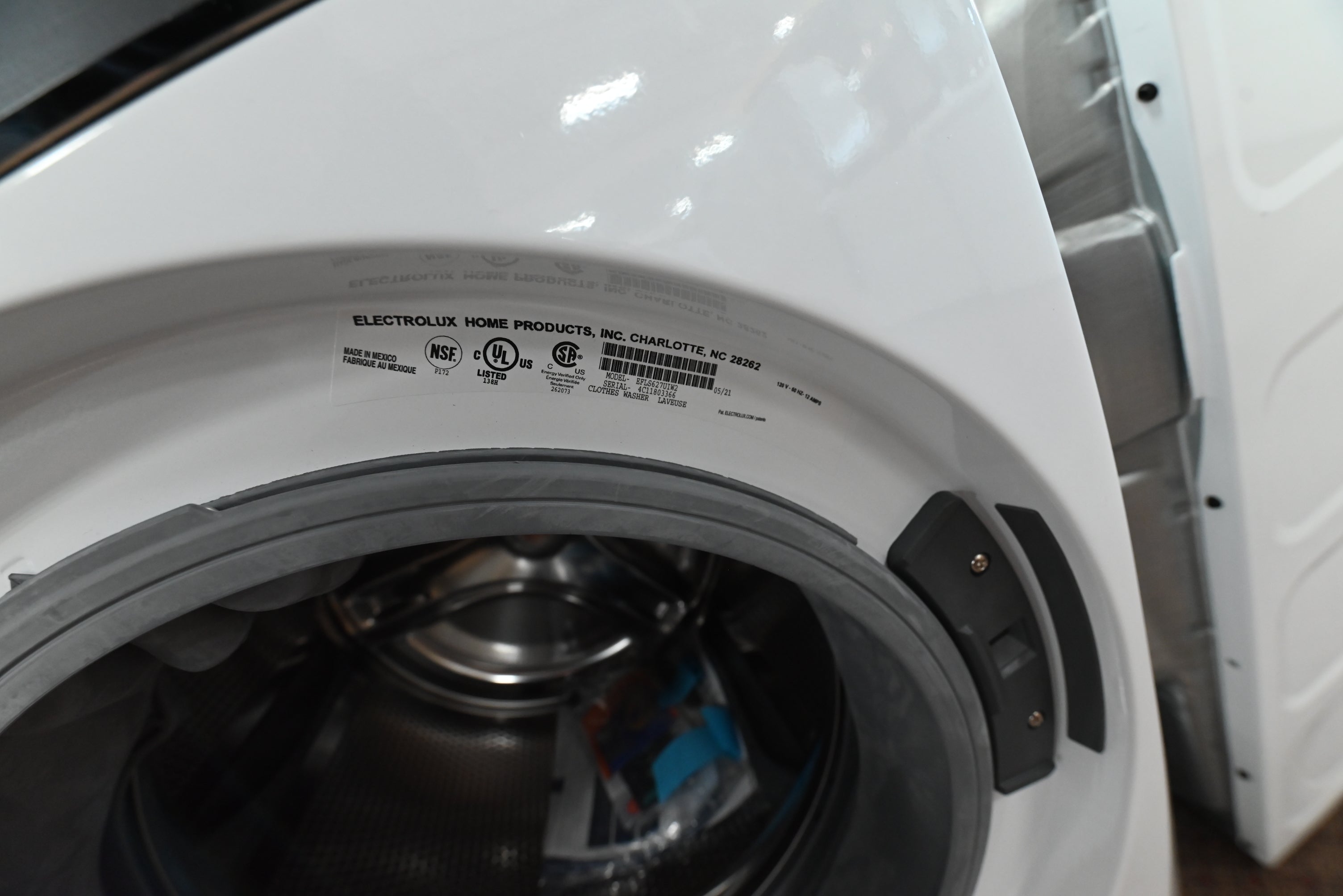 Electrolux 4.4 cu ft stainless steel washer drum open showing spacious capacity