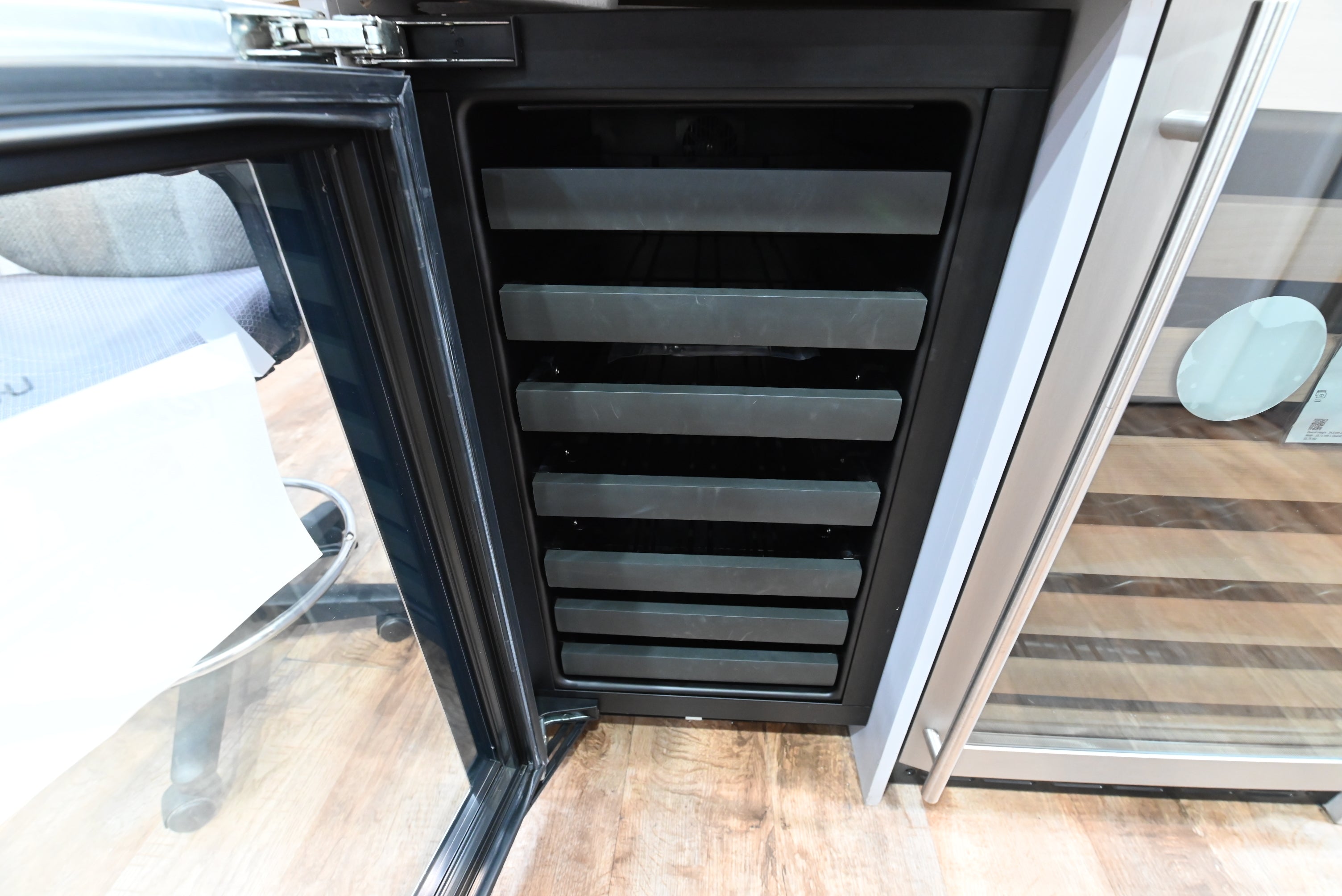 Close up view of the top digital U-Select OLED display on a U-Line 18 inch wine cooler door frame