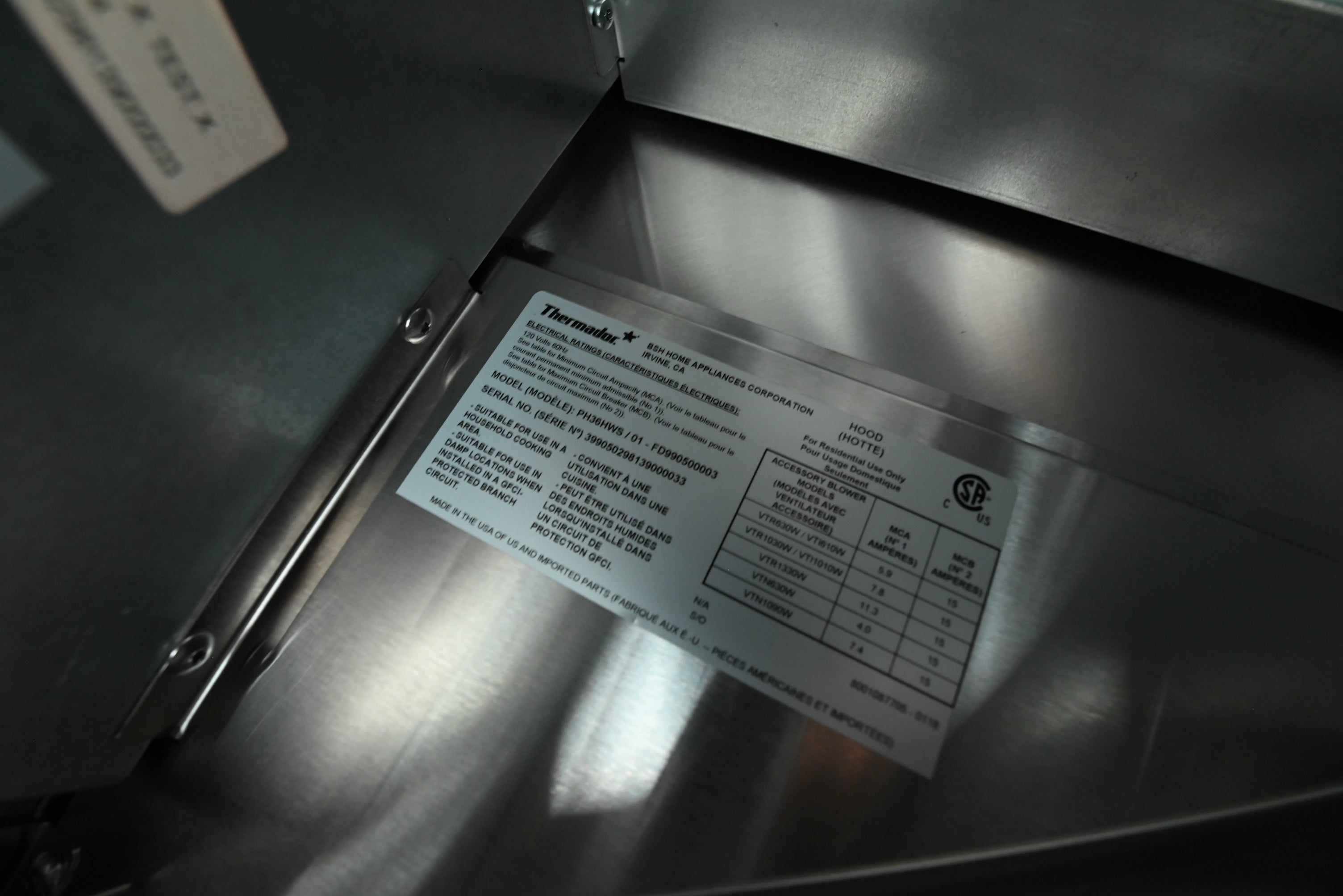 Thermador 36 professional wall hood close up showing front electronic touch controls and seamless corners
