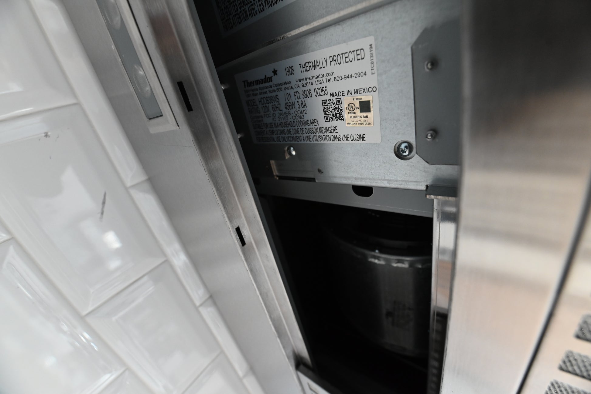 Thermador 36 chimney hood looking up showing dishwasher safe hybrid mesh filters and LED lights