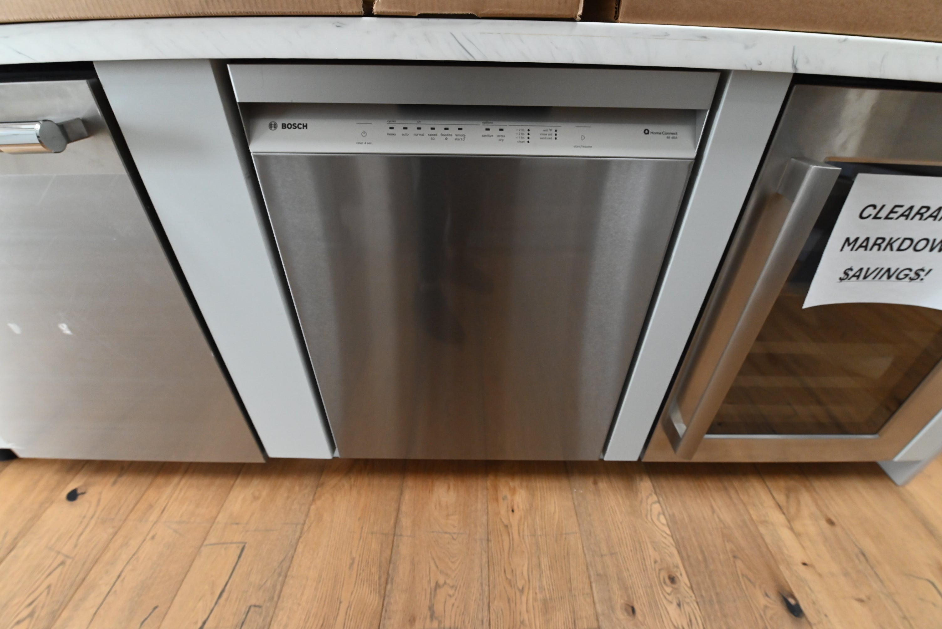 Bosch SHE41CM5N 100 Series 24 inch front control dishwasher front view anti fingerprint stainless steel