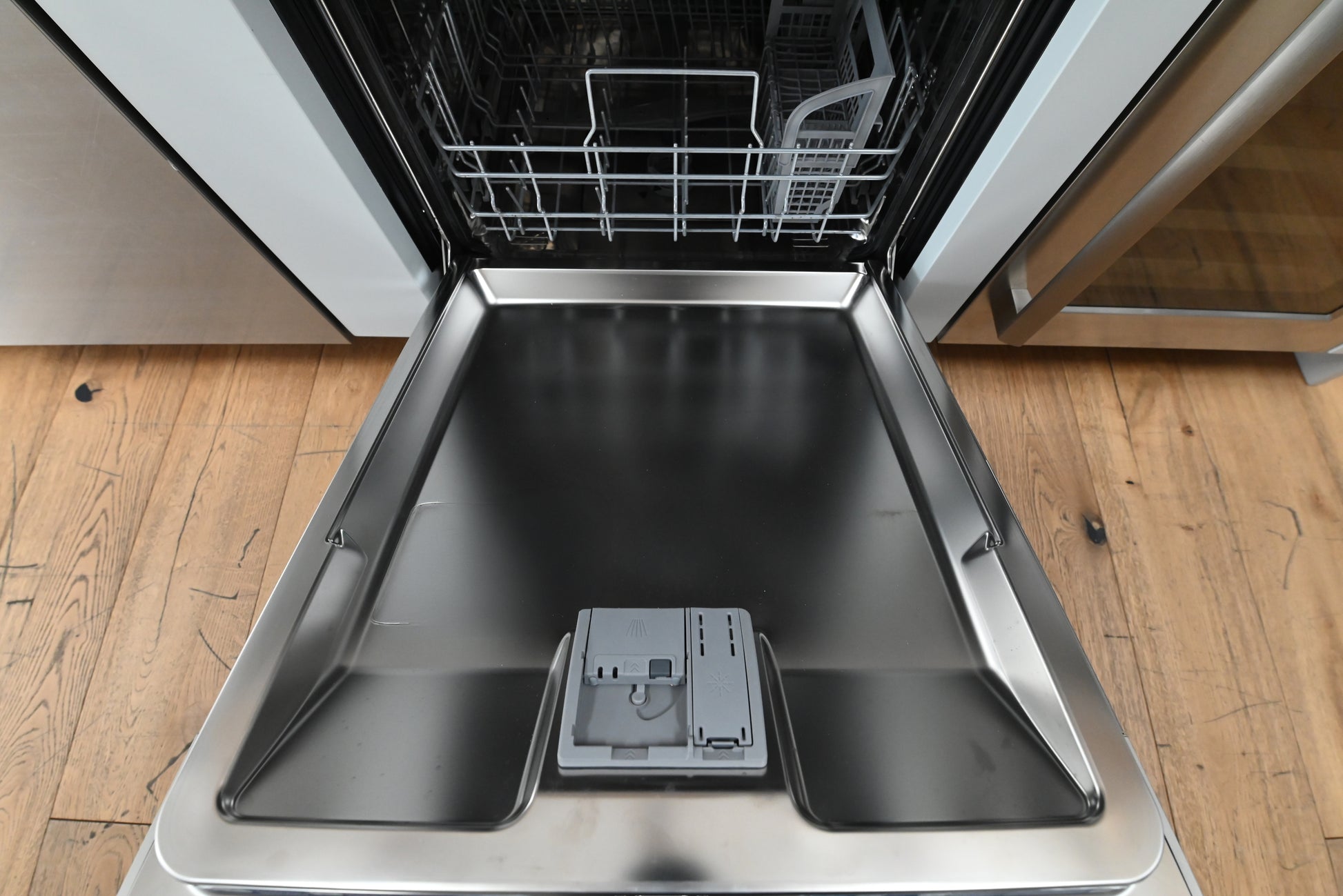 Bosch 24 dishwasher showing sleek front touch controls and integrated recessed pocket handle
