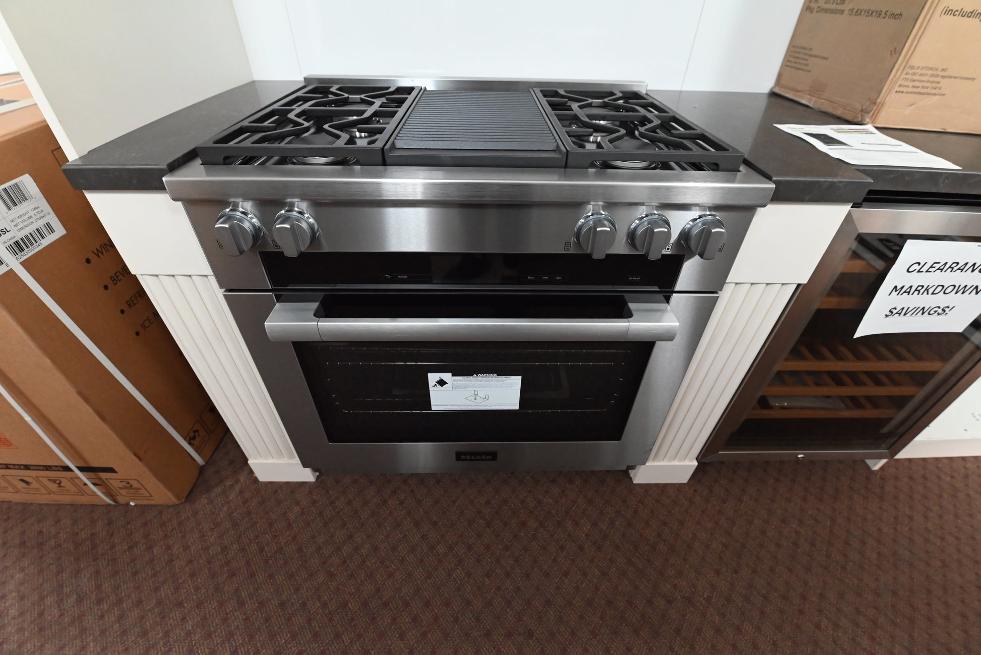 Miele HR 1935 3 G DF GR 36 inch dual fuel range front view in clean touch steel