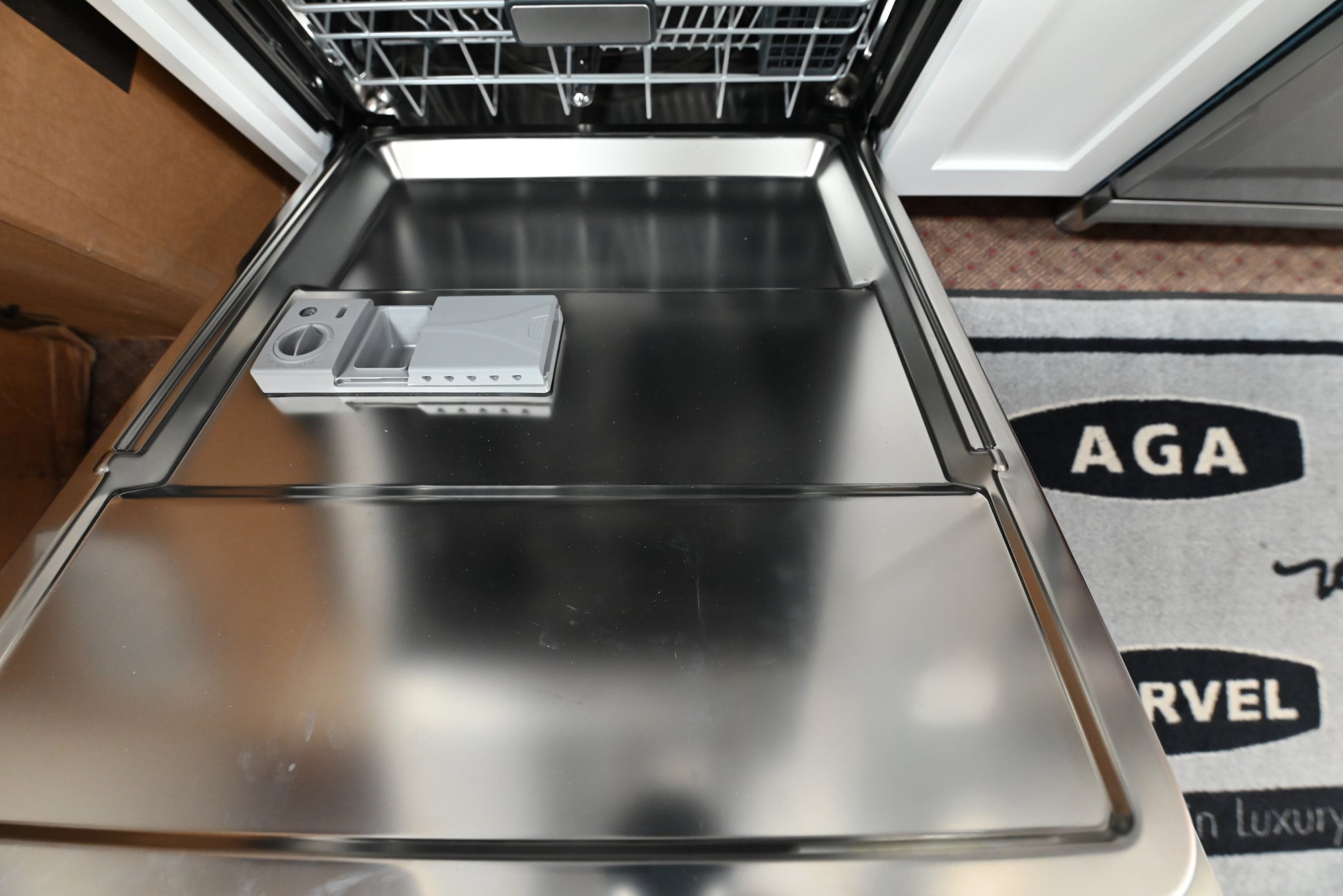 Bertazzoni top control dishwasher showing concealed top edge LED touch interface panel