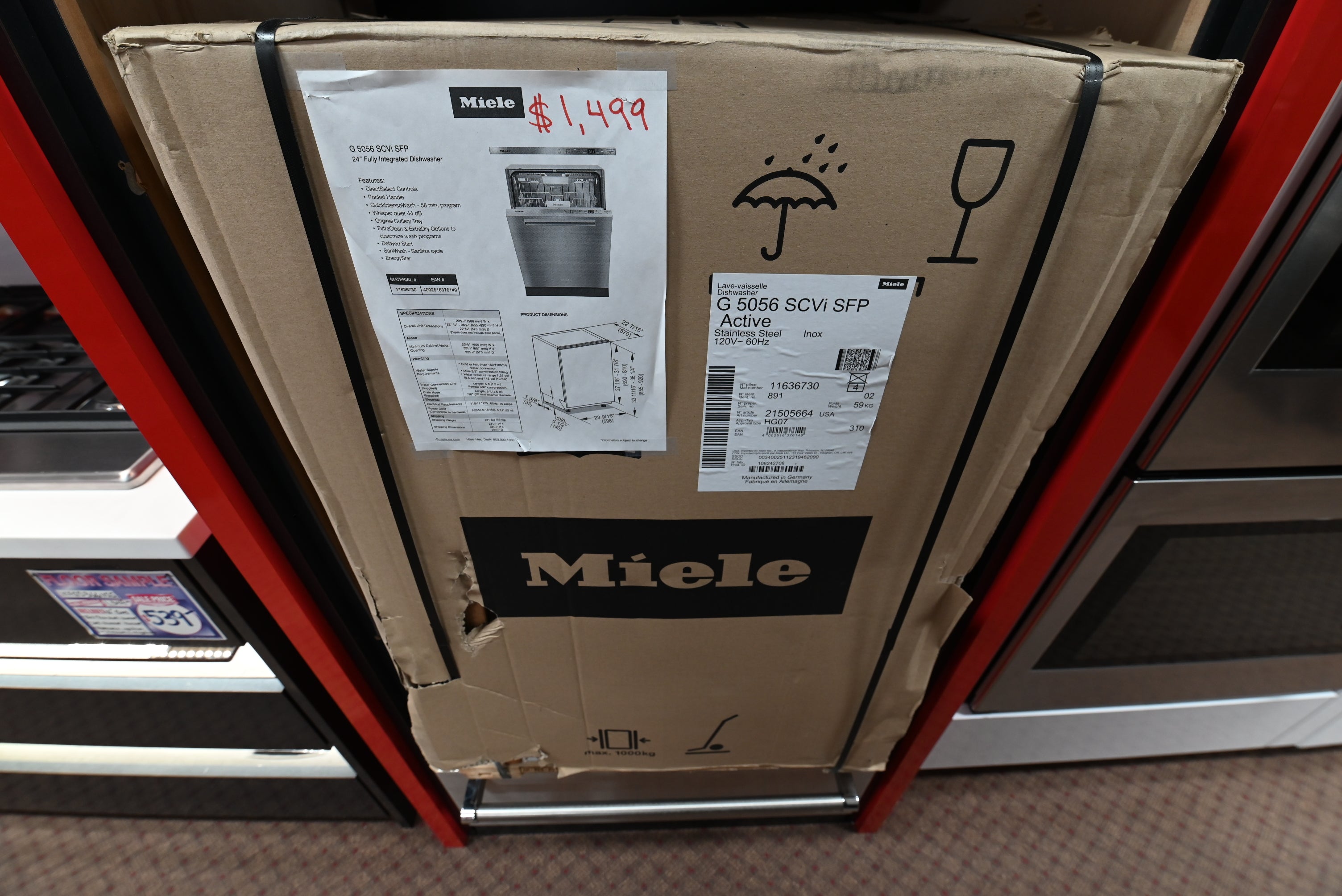 iele G 5056 SCVi SFP fully integrated 24 inch dishwasher front view Clean Touch Steel front panel with PureLine pocket handle