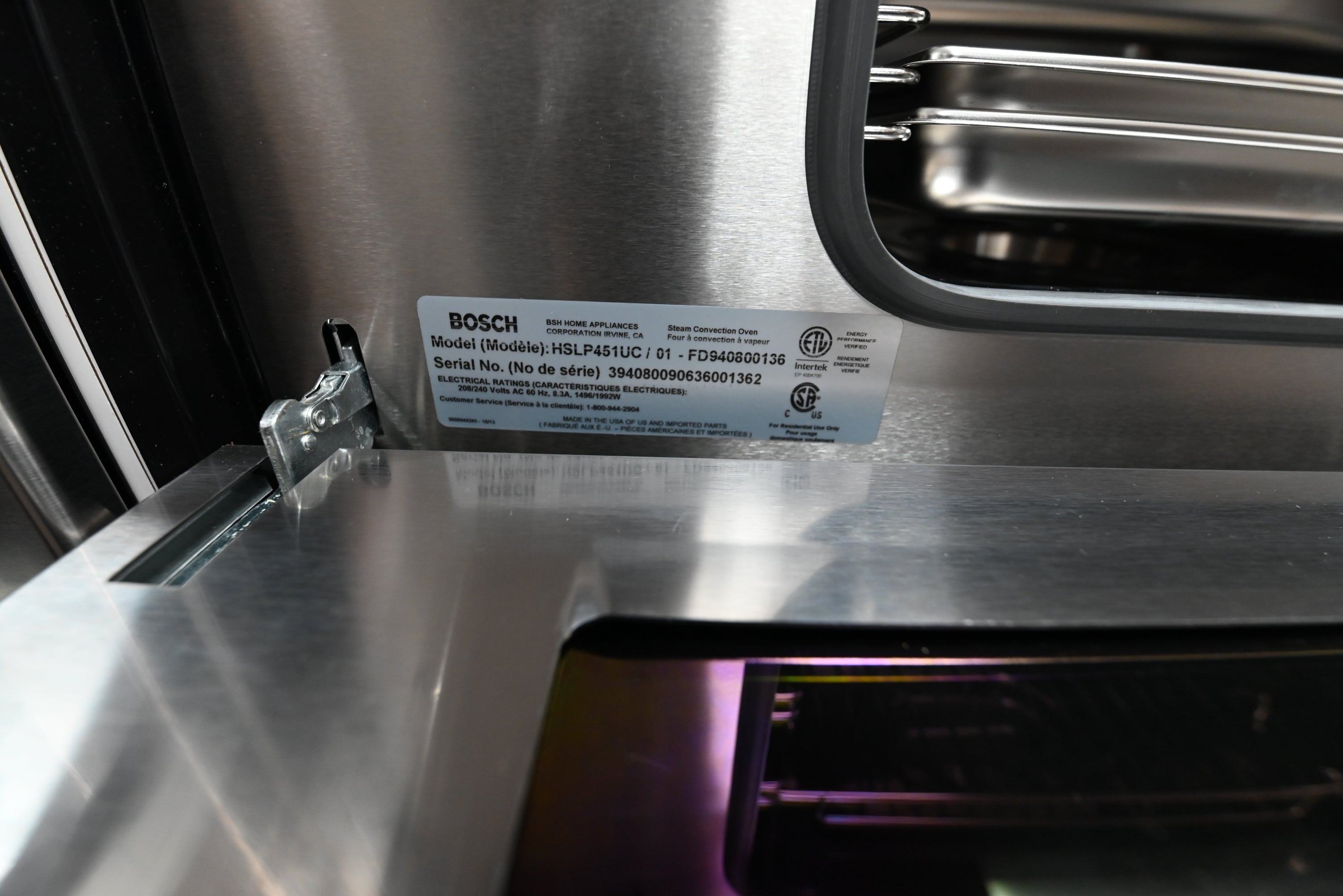 Bosch 30 steam oven installed flush horizontally next to a matching speed oven