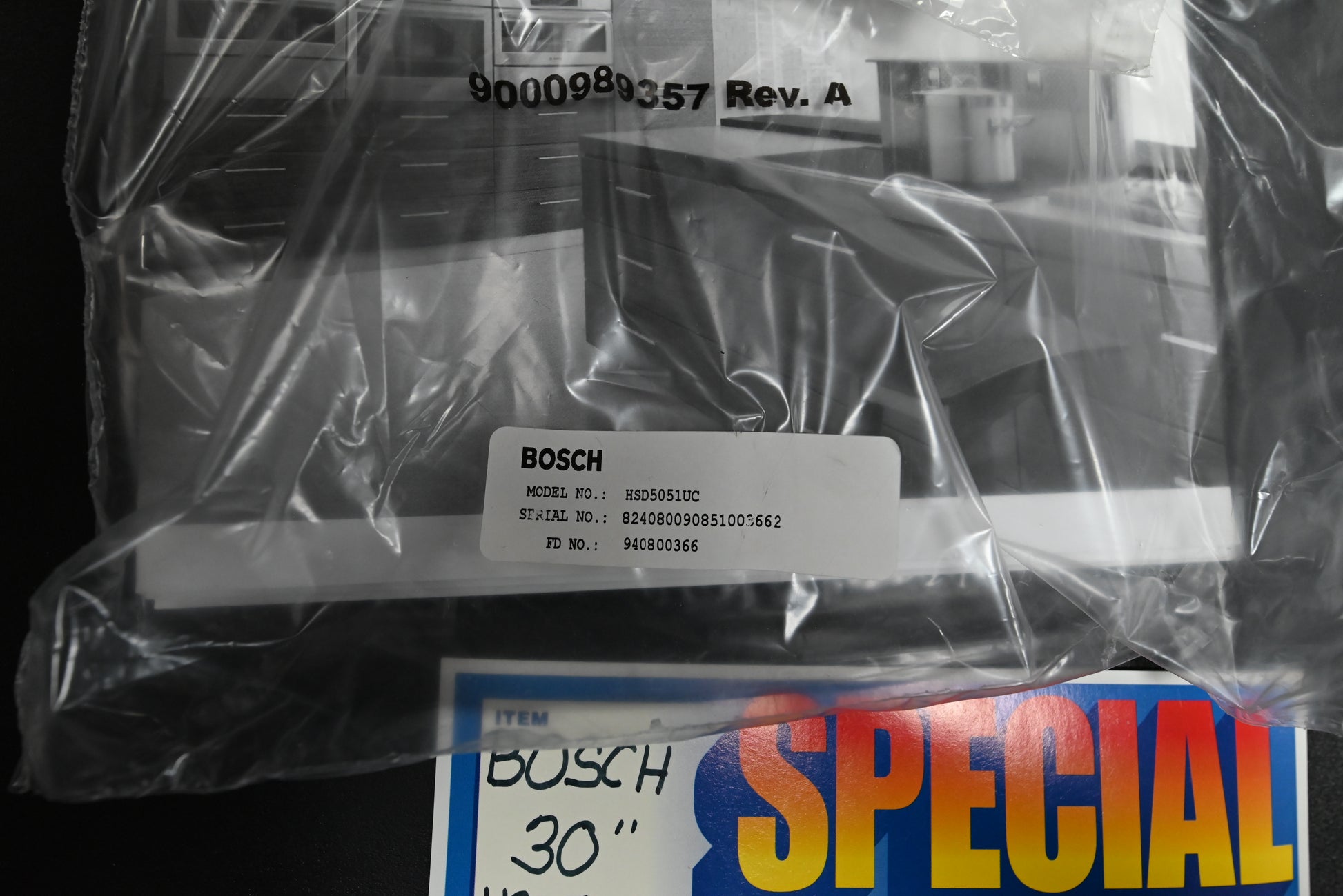 Bosch 30 drawer stacked vertically under wall oven showing seamless flush profile