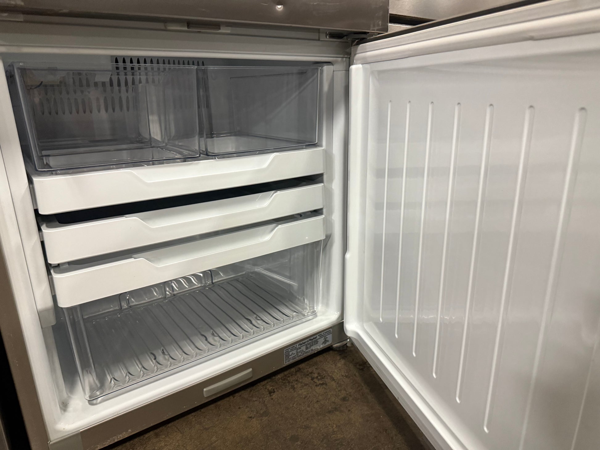 Fisher & Paykel RF135BDRUX4 25" Stainless Steel Counter Depth Bottom Freezer Refrigerator