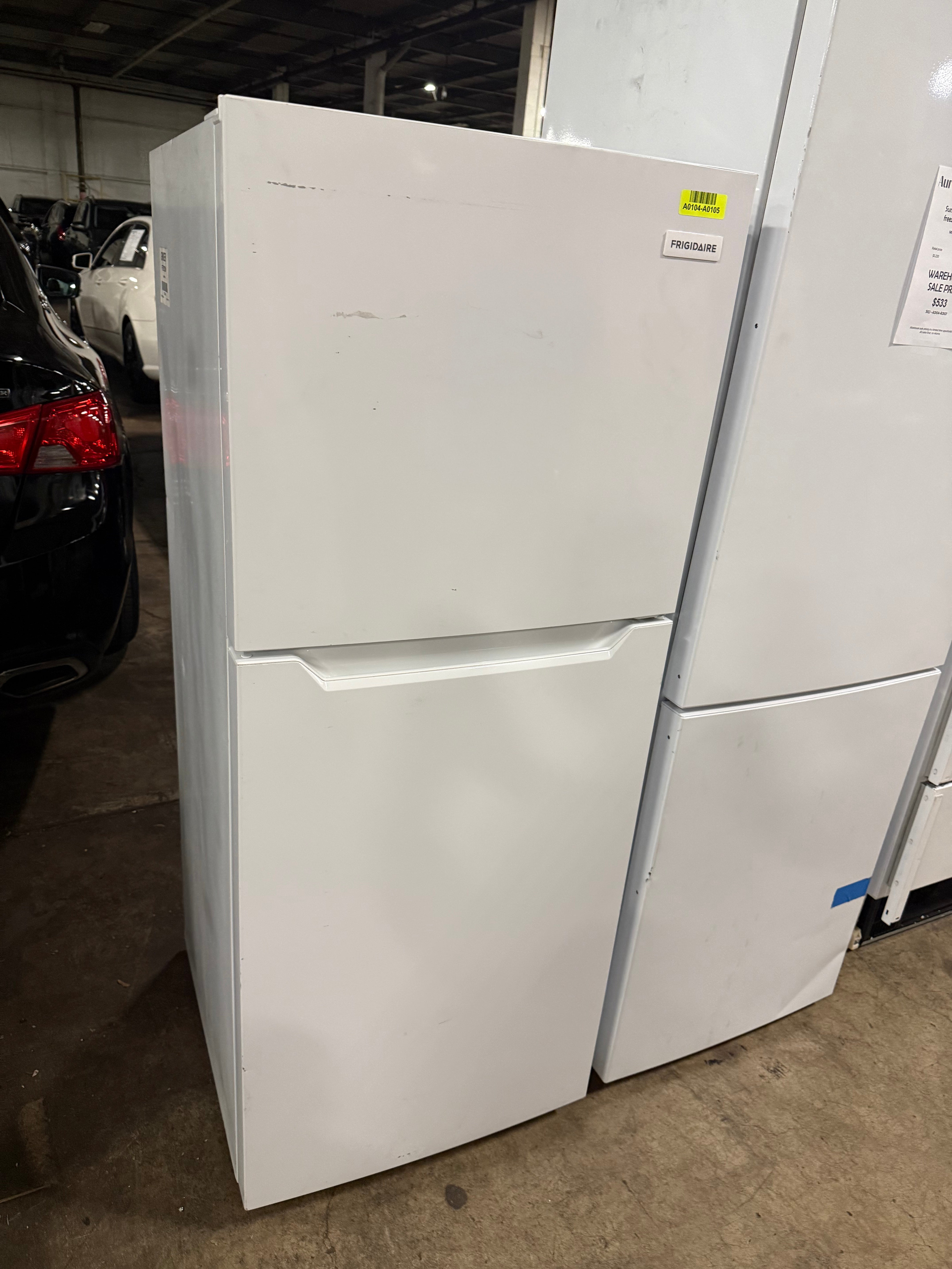 Compact apartment-size refrigerator with top freezer compartment