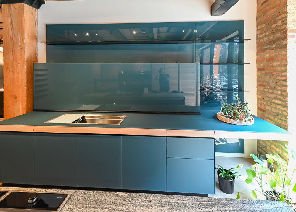 Valcucine Green Tea Glass Modern Showroom Kitchen with Island and Luxury Appliances