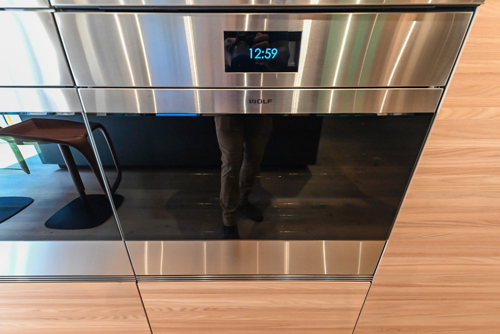 Valcucine Venture: Green Tea Glass Modern Kitchen with Island & Luxe Appliances