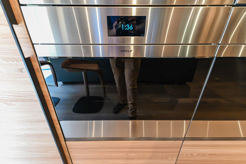 Valcucine Venture: Green Tea Glass Modern Kitchen with Island & Luxe Appliances