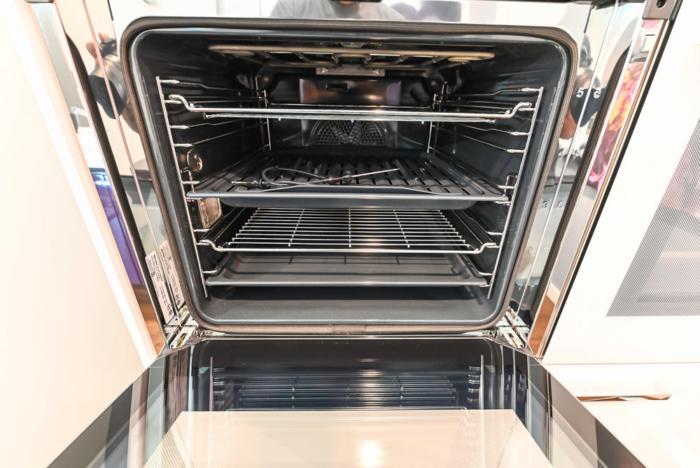 Poggenpohl Perfection: High Gloss White & Purple Modern Showroom Kitchen