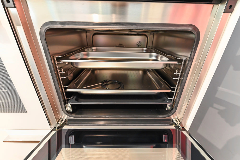 Poggenpohl Perfection: High Gloss White & Purple Modern Showroom Kitchen