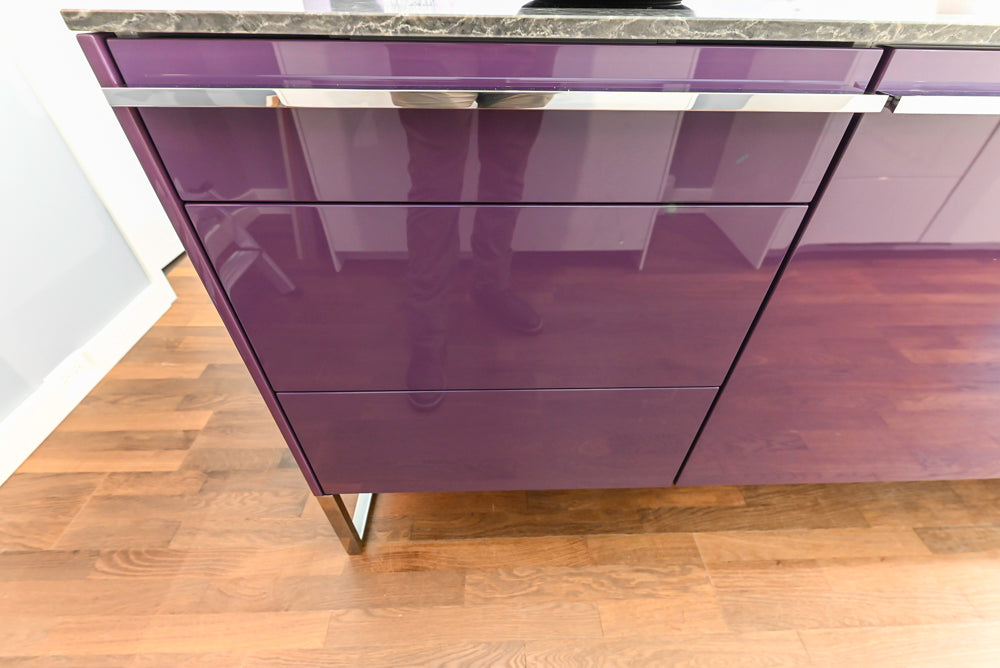Poggenpohl Perfection: High Gloss White & Purple Modern Showroom Kitchen