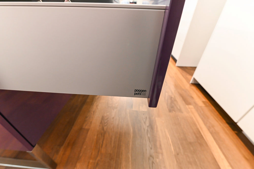 Poggenpohl Perfection: High Gloss White & Purple Modern Showroom Kitchen