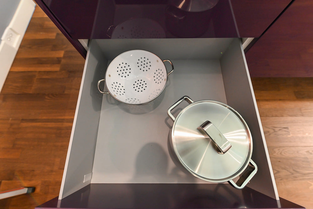 Poggenpohl Perfection: High Gloss White & Purple Modern Showroom Kitchen