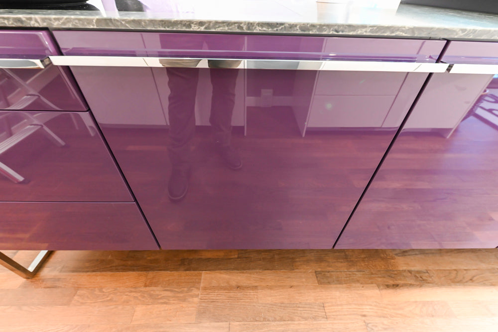 Poggenpohl Perfection: High Gloss White & Purple Modern Showroom Kitchen