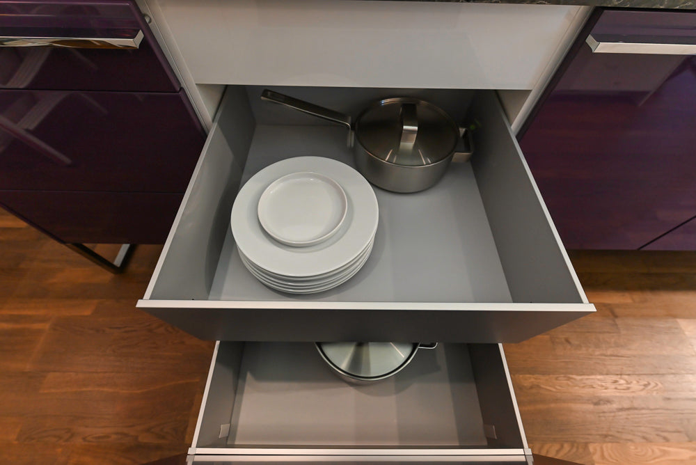 Poggenpohl Perfection: High Gloss White & Purple Modern Showroom Kitchen