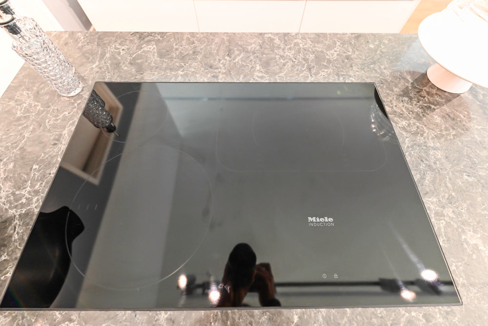 Poggenpohl Perfection: High Gloss White & Purple Modern Showroom Kitchen