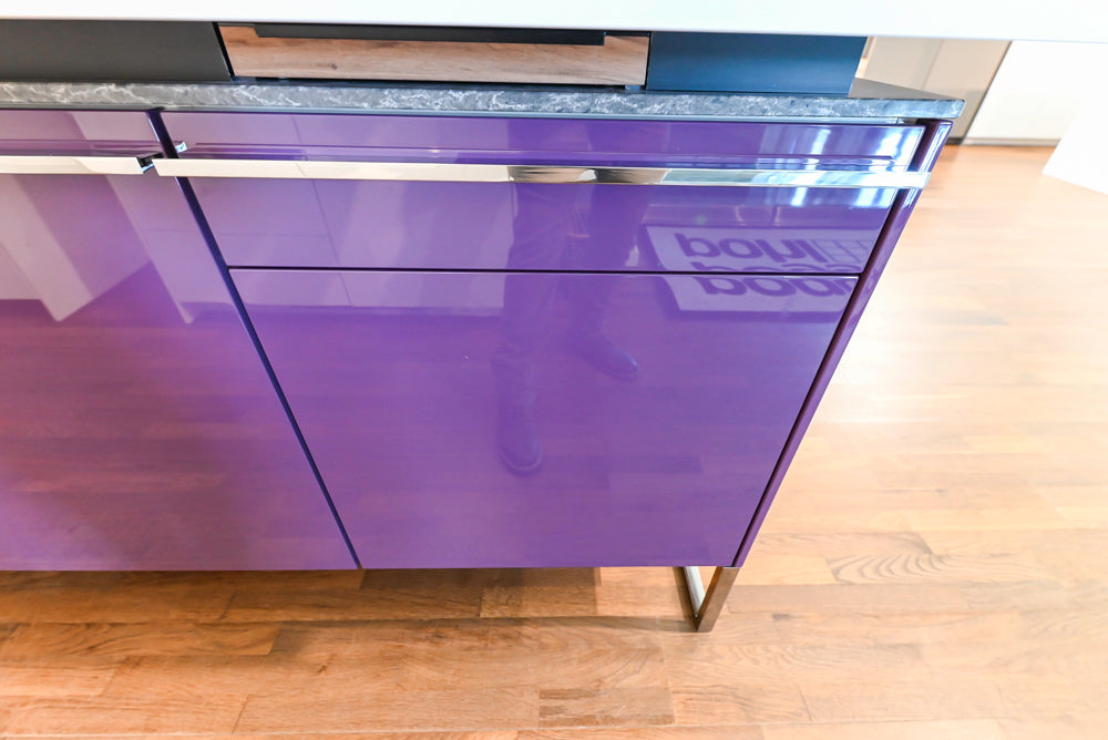 Poggenpohl Perfection: High Gloss White & Purple Modern Showroom Kitchen