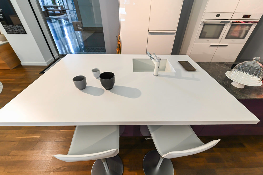 Poggenpohl Perfection: High Gloss White & Purple Modern Showroom Kitchen