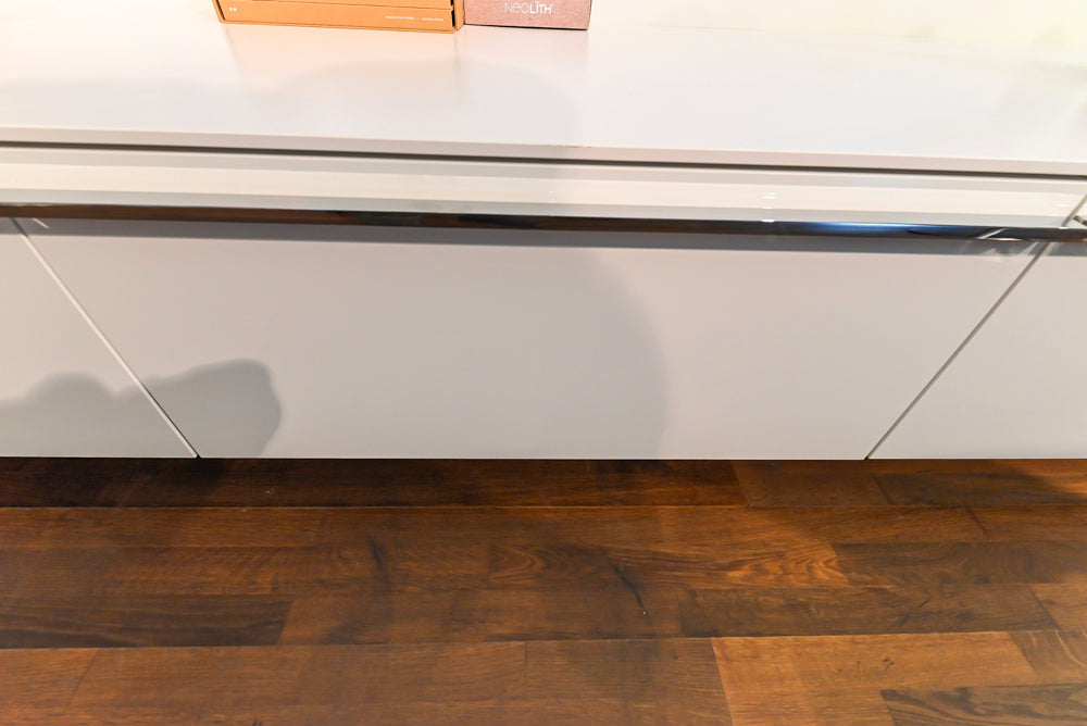 Poggenpohl Perfection: High Gloss White & Purple Modern Showroom Kitchen