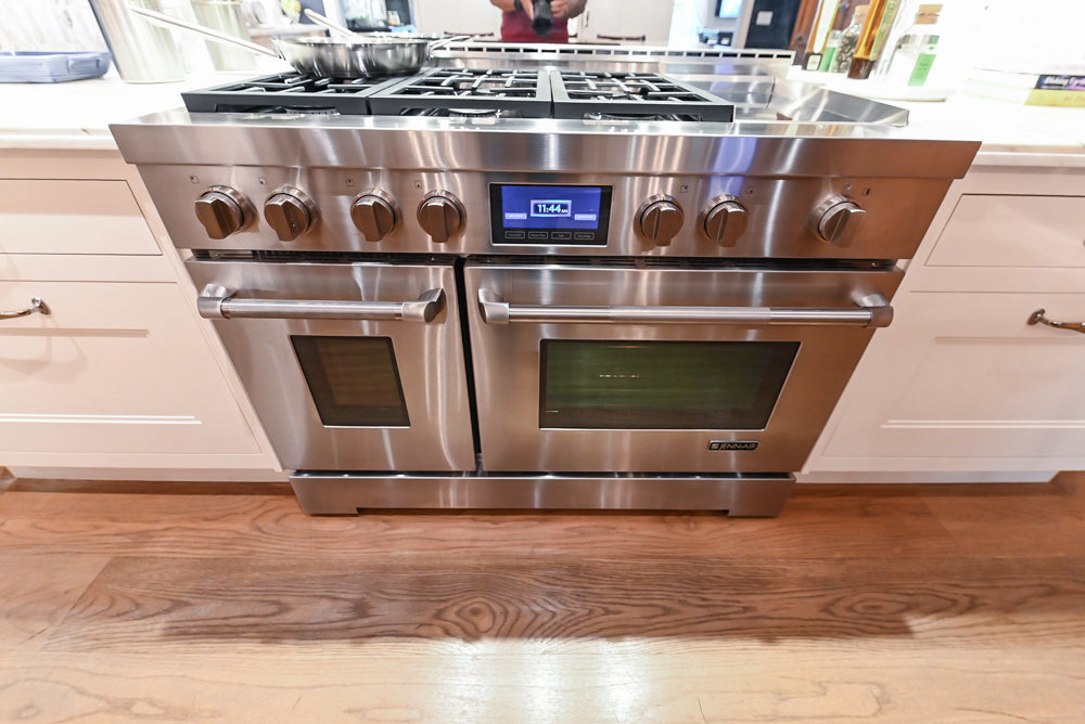 Christopher Peacock Refectory White Kitchen with Wooden Island, Marble Countertops and JennAir Appliances