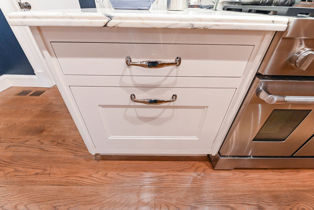Christopher Peacock Refectory White Kitchen with Wooden Island, Marble Countertops and JennAir Appliances