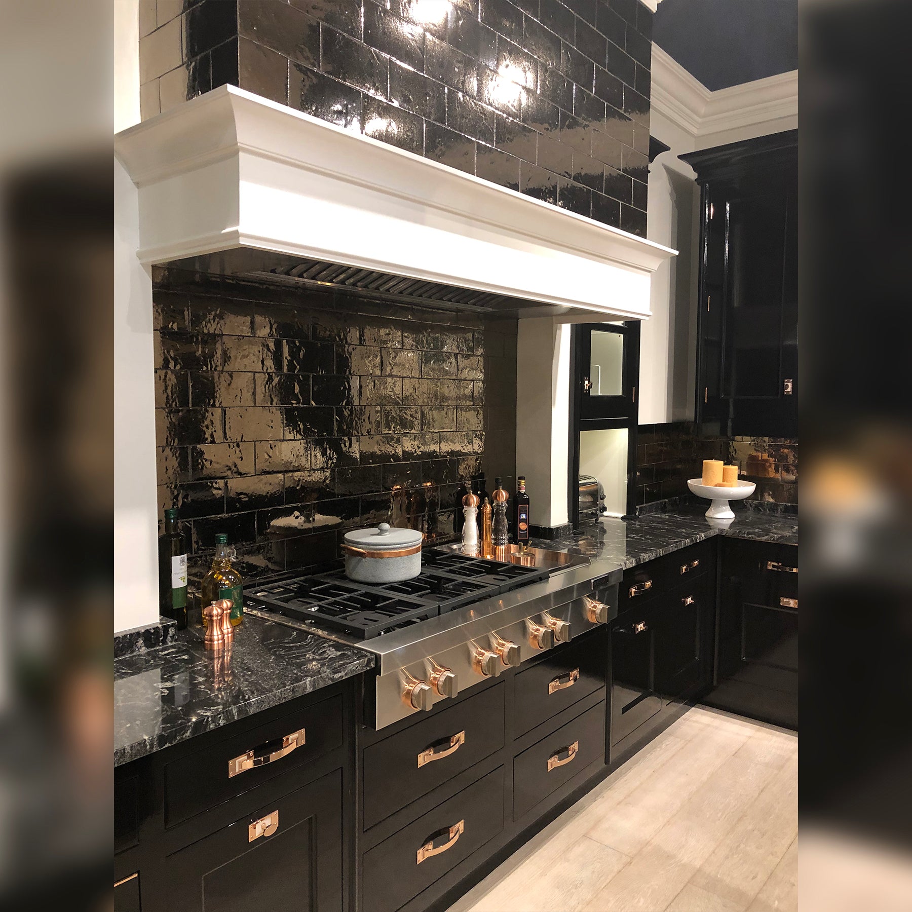 Christopher Peacock Traditional Black Kitchen with Stone Countertops & JennAir Appliances
