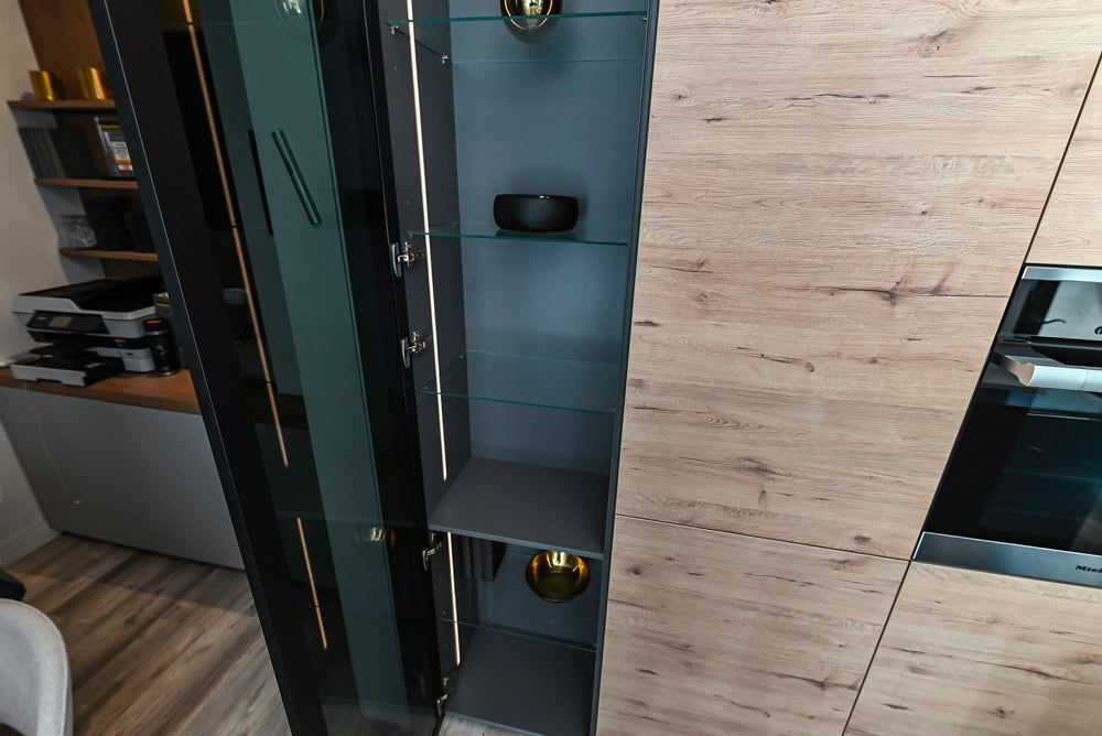 Nolte Küchen Modern Black Kitchen with Unique Accent Wall Cabinetry