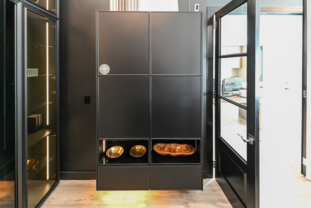 Nolte Küchen Modern Black Kitchen with Unique Accent Wall Cabinetry
