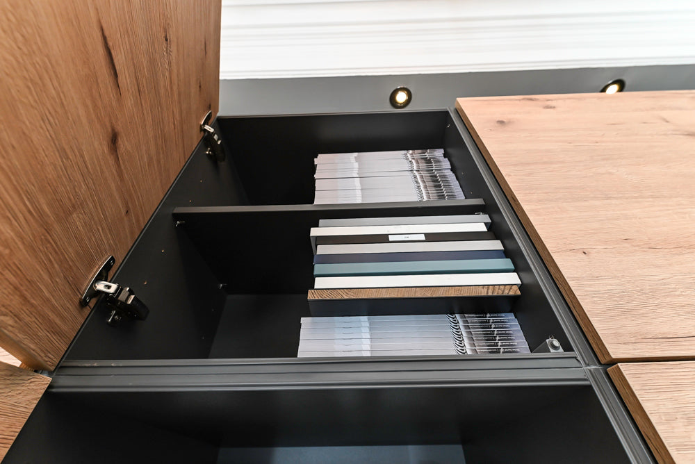 Nolte Küchen Modern Black Kitchen with Unique Accent Wall Cabinetry