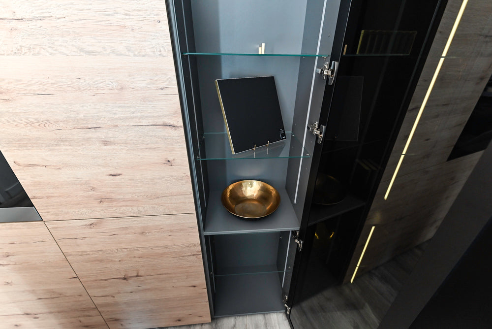 Nolte Küchen Modern Black Kitchen with Unique Accent Wall Cabinetry