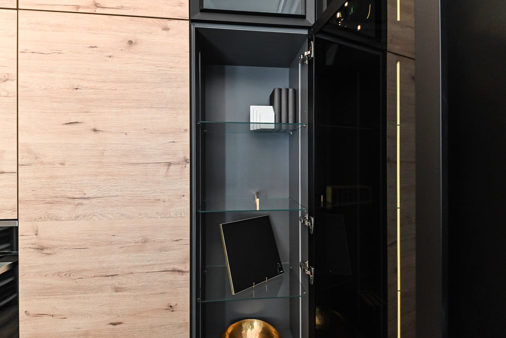 Nolte Küchen Modern Black Kitchen with Unique Accent Wall Cabinetry