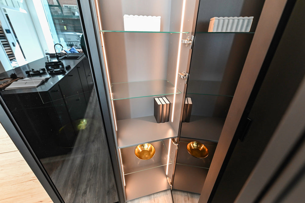 Nolte Küchen Modern Black Kitchen with Unique Accent Wall Cabinetry