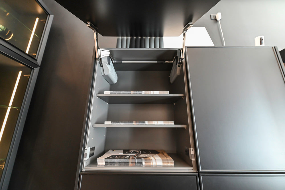 Nolte Küchen Modern Black Kitchen with Unique Accent Wall Cabinetry