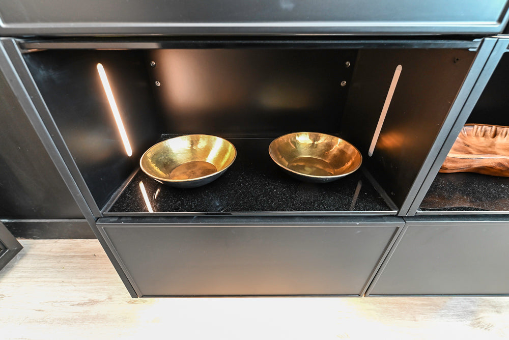 Nolte Küchen Modern Black Kitchen with Unique Accent Wall Cabinetry